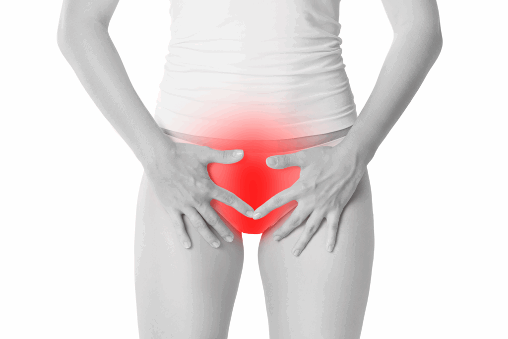 Woman with hands over groin, signifying genital itching