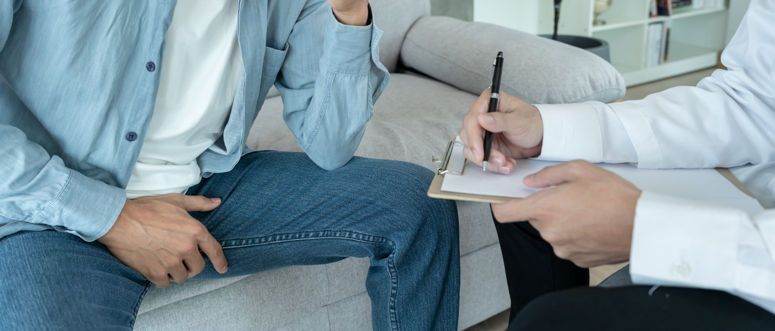 Man speaking with doctor